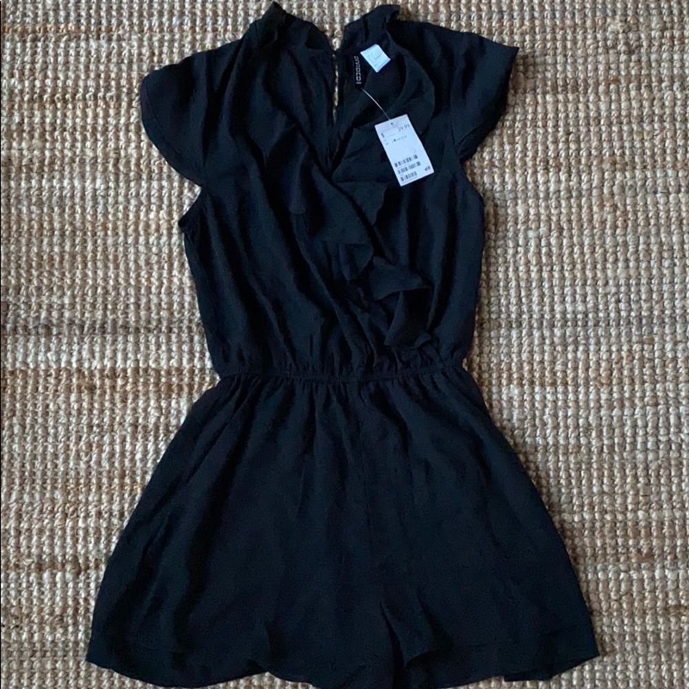 Black H&M romper with ruffles